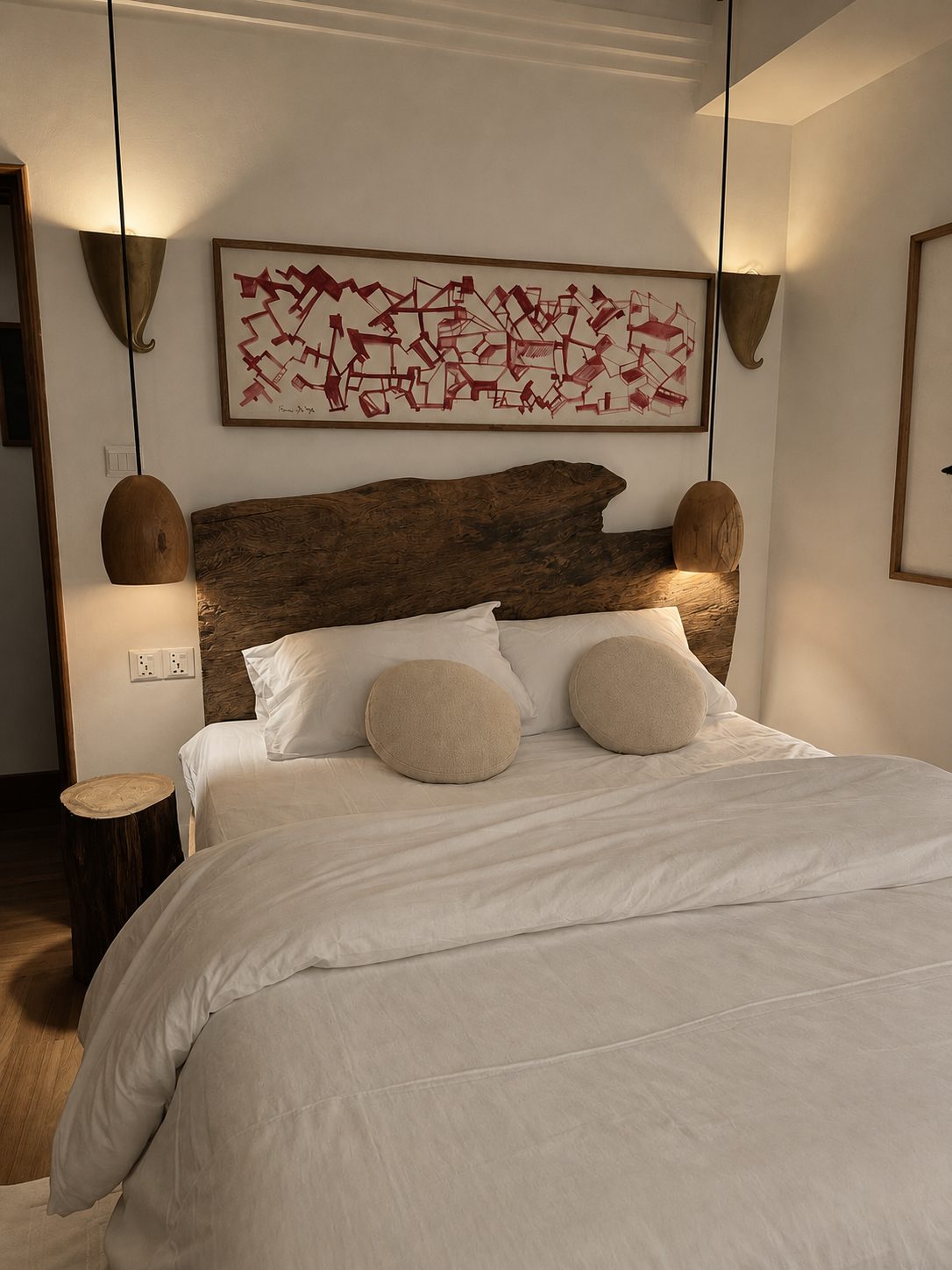Bedroom with live-edge teak headboard